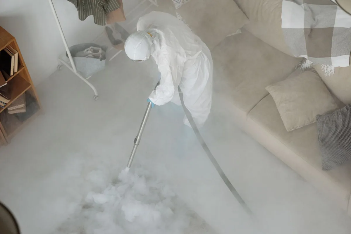 Biohazard cleanup technician in protective equipment, Edmonds, WA